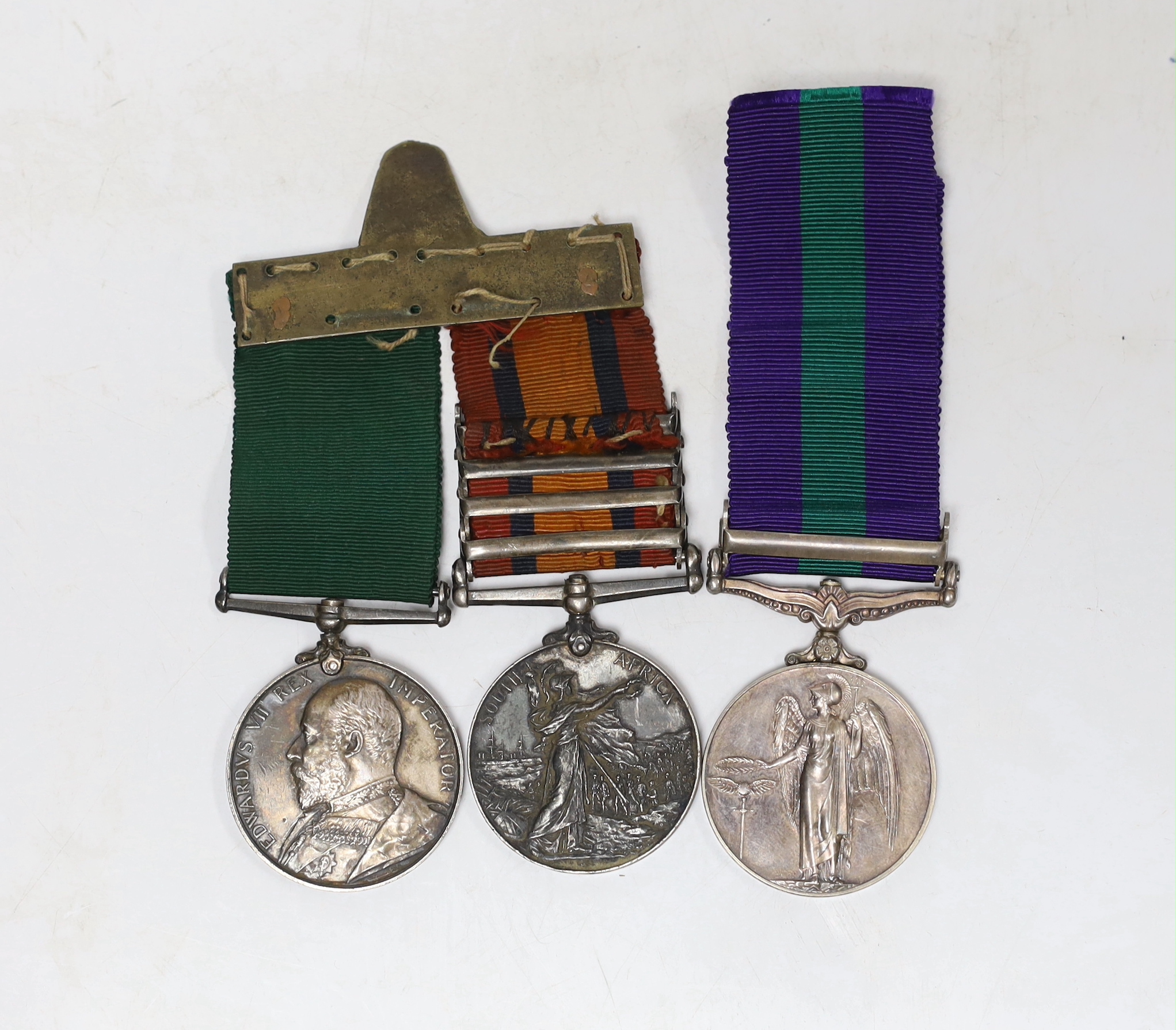 Three medals. A pair to Pte. T. Gibson, Vol. Coy. Border Regt. comprising the South African Medal with bars for Cape Colony, Orange Free State, Transvaal and South Africa 1901, and a Volunteer Force Long Service Medal, t